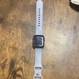 Apple Smartwatch with Silver Case and Light Gray Band
